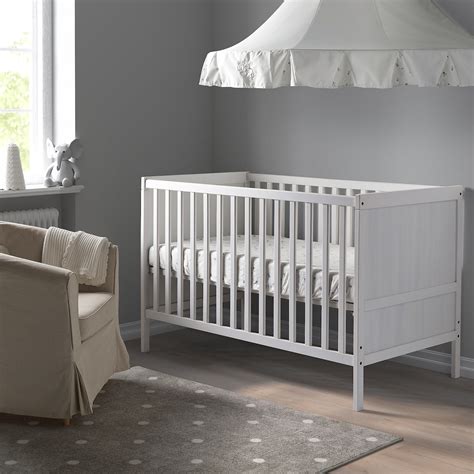 standard crib size in cm; halo glide bassinet; graco mattress; cot changing table. . Ikea white crib